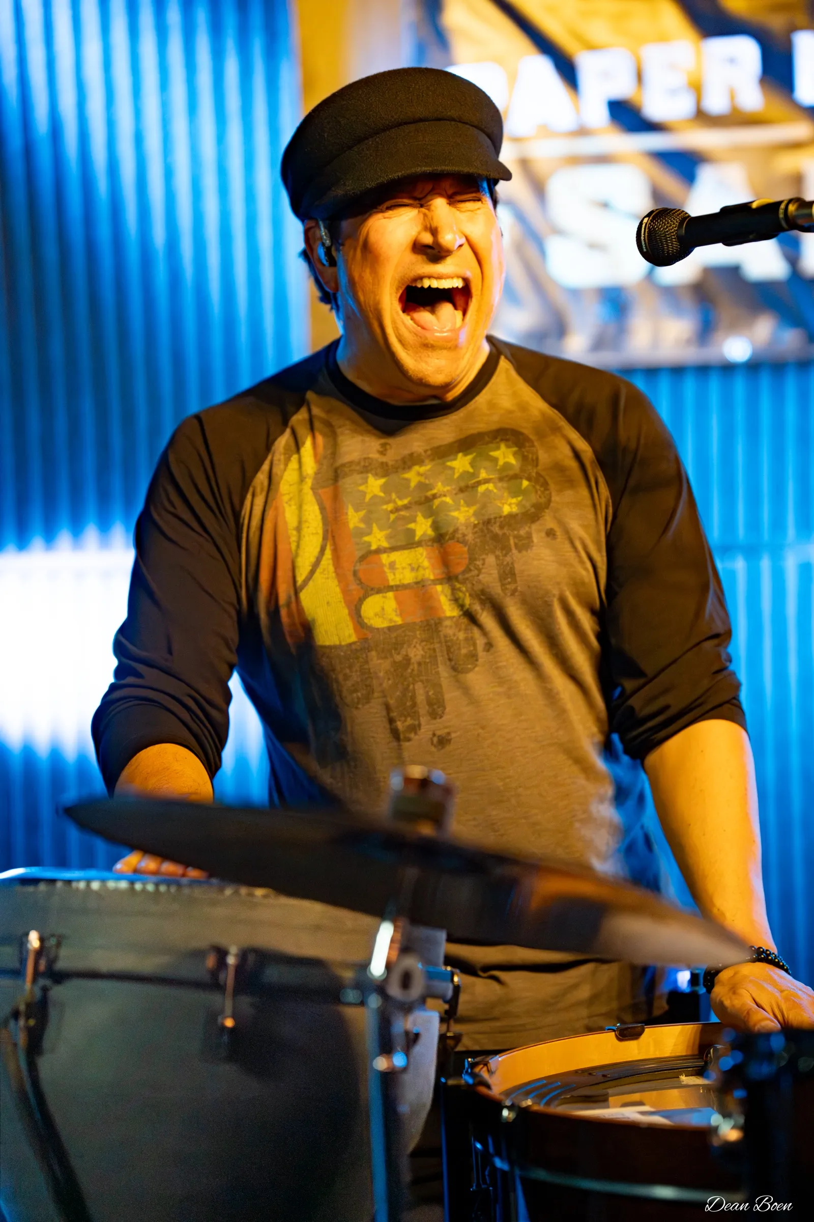 Drummer shouting mid-song behind the kit